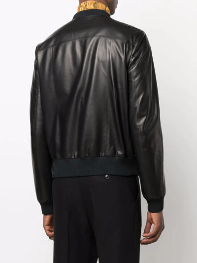 Shop Prada Logo Debossed Leather Bomber Jacket In Schwarz