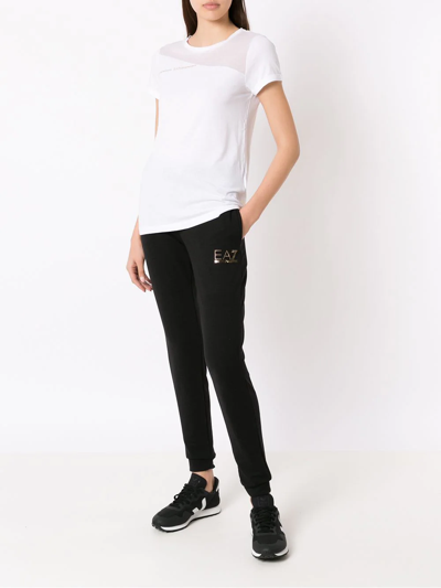 Shop Ea7 Studded Logo Track Pants In Black
