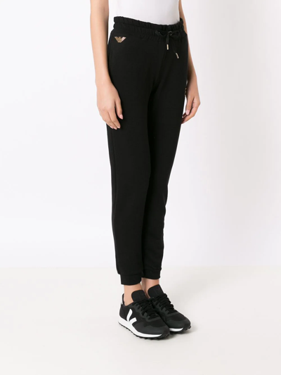 Shop Ea7 Studded Logo Track Pants In Black