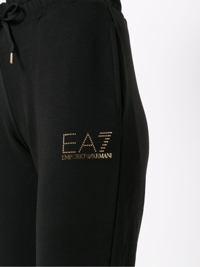 Ea7 Studded Logo Track Pants In Black