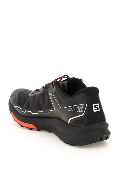 Shop Salomon Ultra Raid Sneakers In Black,red