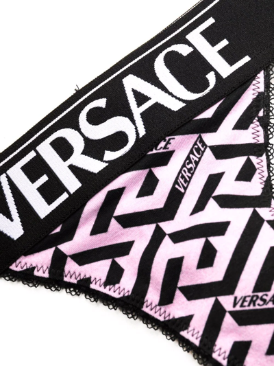 Shop Versace La Greca Pattern Thong In Pink