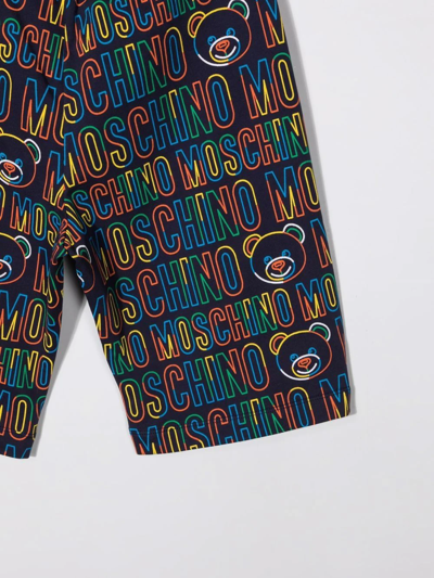 Shop Moschino All-over Logo Print Shorts In Blue