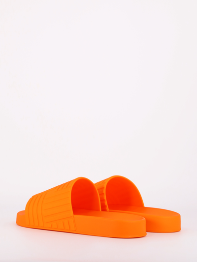 Shop Bottega Veneta Orange Slider Sandal