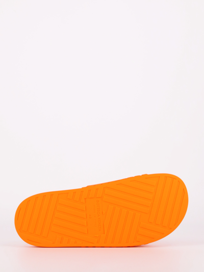 Shop Bottega Veneta Orange Slider Sandal
