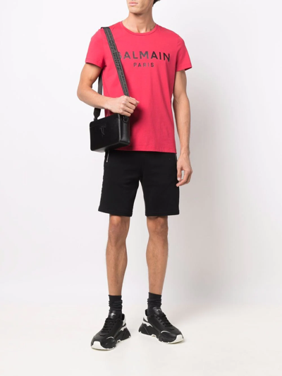 Shop Balmain Embossed-logo Bermuda Shorts In Black
