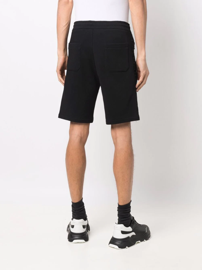 Shop Balmain Embossed-logo Bermuda Shorts In Black