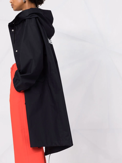 Shop Jil Sander Logo-print Hooded Raincoat In Blau