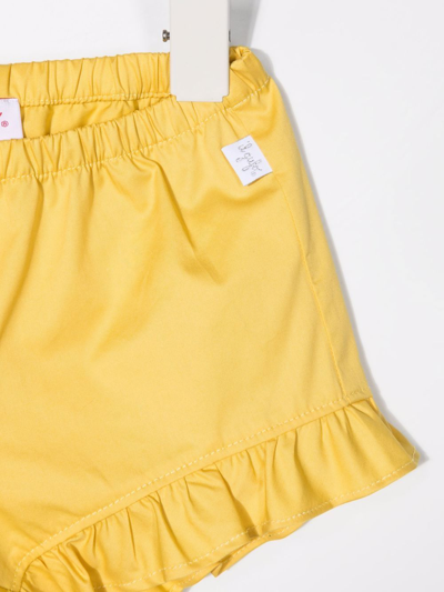 Shop Il Gufo Ruffled Hem Cotton Shorts In Yellow