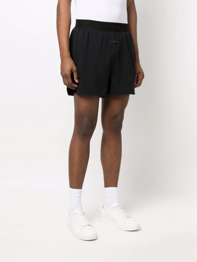 Shop Fear Of God Logo-waist Slip-on Deck Shorts In Black
