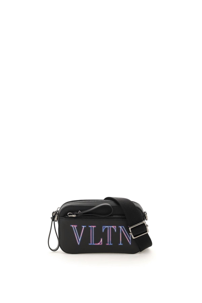 Shop Valentino Garavani Leather Neon Vltn Small Crossbody Bag In Black