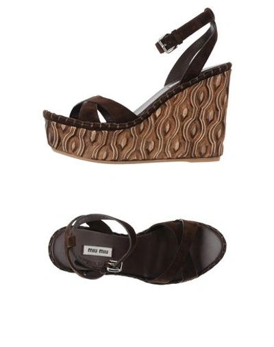 Shop Miu Miu Sandals In Dark Brown