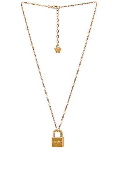 Shop Versace Lock Necklace In Oro