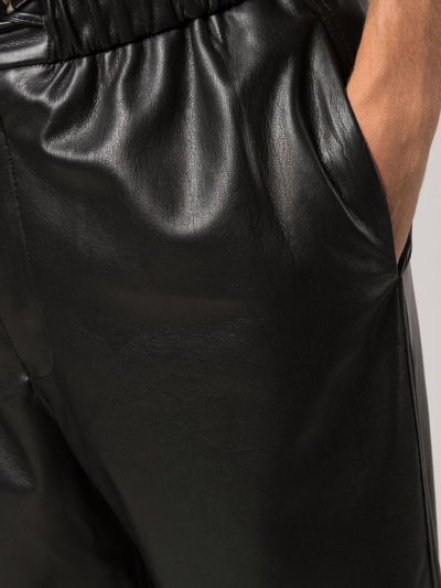 Shop Nanushka Straight-leg Vegan Leather Trousers In Black
