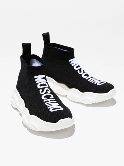 Shop Moschino Teddy Sole Logo Sneakers In Black