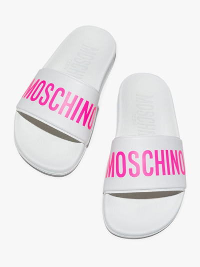 Shop Moschino Logo-print Flat Slides In White