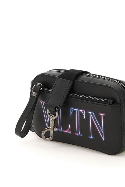 Shop Valentino Leather Neon Vltn Small Crossbody Bag In Black