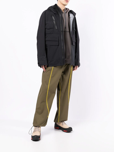 White Mountaineering Hooded Zipped Jacket In Schwarz