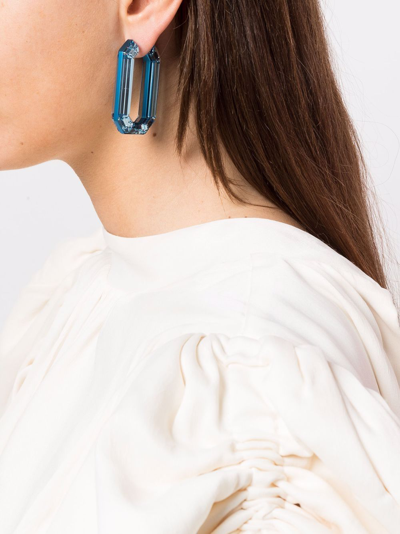 Shop Swarovski Lucent Hoop Earrings In Blau