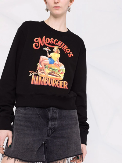 Shop Moschino Dinner-print Sweatshirt In Schwarz