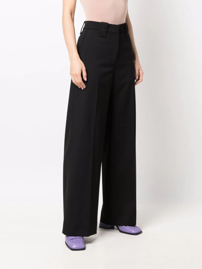 Shop Ganni Wool-blend Wide-leg Trousers In Schwarz