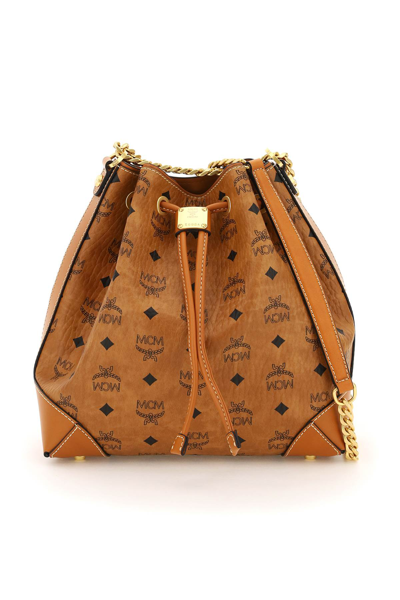 Shop Mcm Logo Printed Chained Bucket Bag In Brown