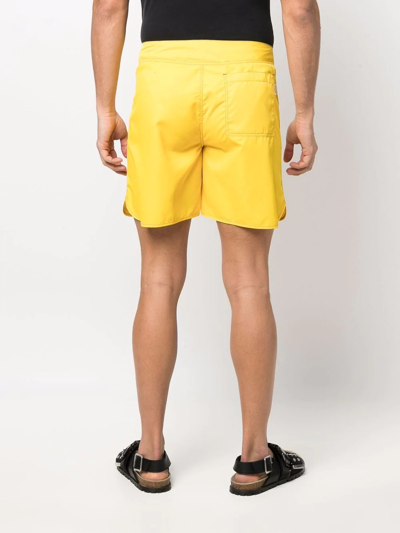 Shop Jil Sander Drawstring-waist Patch-pocket Swim Shorts In Gelb