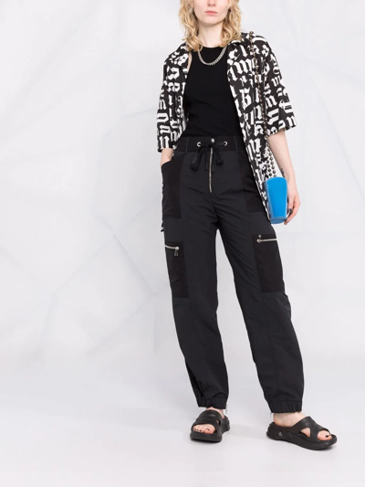 Moncler Drawstring Zip Trousers In Black