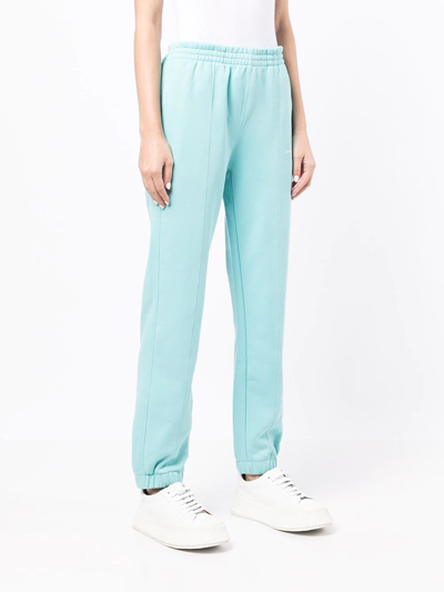 Shop Helmut Lang Logo-embroidered Cotton Track Pants In Blue