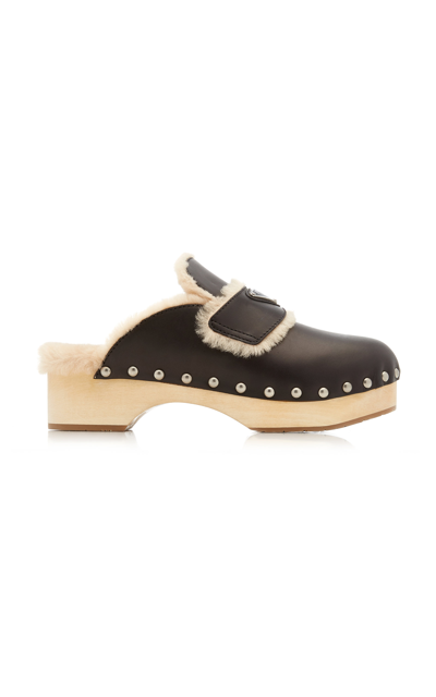 Shop Prada Women's Studded Fur-lined Leather Clogs In Black