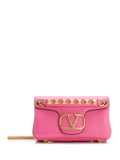 Shop Valentino Garavani Roman Stud Shoulder Bag In Pink