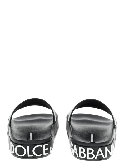 Shop Dolce & Gabbana Woman's Black Slide Rubber Sandals With Logo