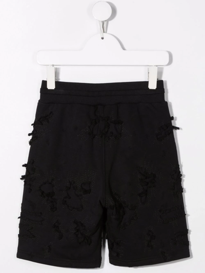 Shop Givenchy Distressed-effect Shorts In Black