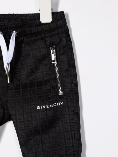 Shop Givenchy 4g Motif Joggers In Black