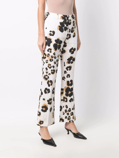 Shop Boutique Moschino Leopard-print Trousers In White