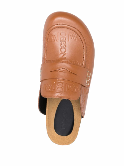 Shop Jw Anderson Logo-debossed Loafer Mules In Brown