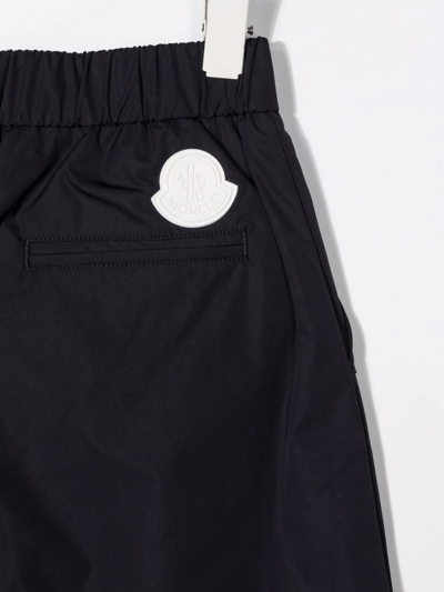Moncler Logo-print Layered-effect Trousers In Blue