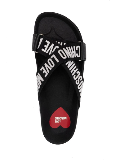 Shop Love Moschino Logo Open-toe Slides In Black