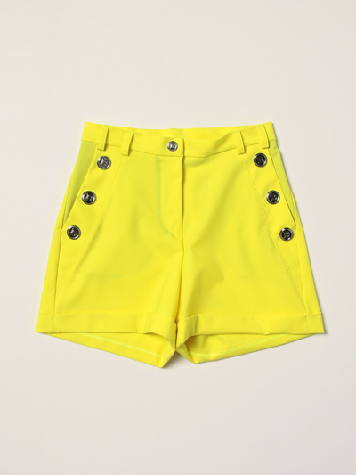 Shop Balmain Stretch Virgin Wool Shorts In Yellow