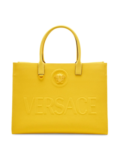 Shop Versace Women's Logo Canvas Tote In Yellow Yellow  Gold