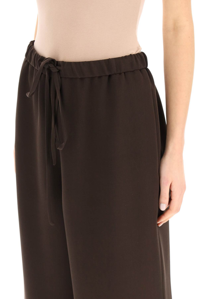 Shop Valentino Cady Couture Trousers In Brown