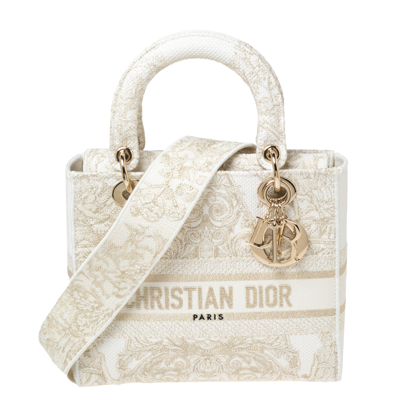 Cream dior bag hotsell