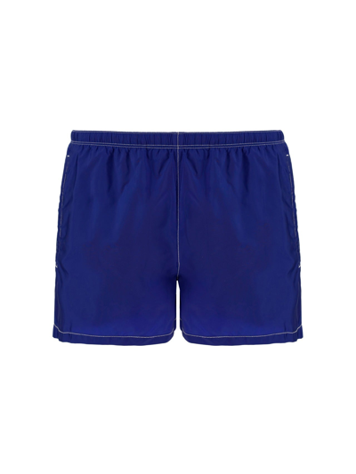 Shop Prada Logo Plaque Swim Shorts In Blue
