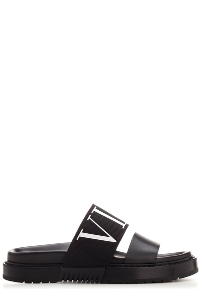 Shop Valentino Logo Printed Open Toe Sandals In Black