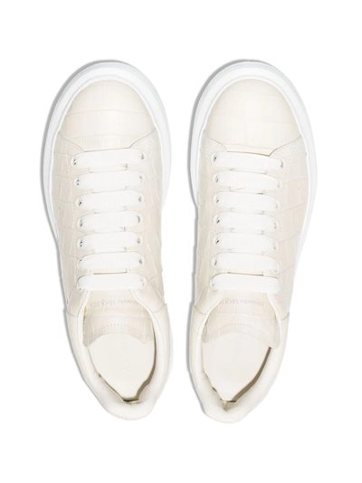 Shop Alexander Mcqueen Oversized Crocodile-embossed Sneakers In White
