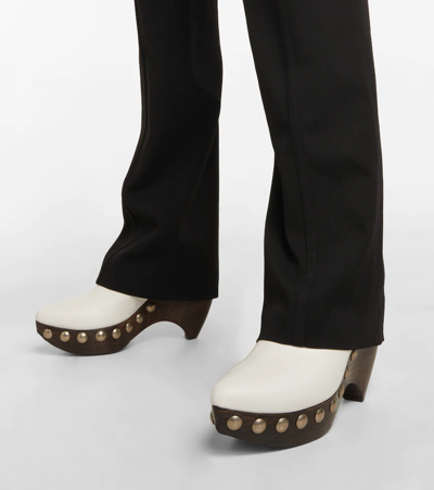 Shop Alaïa Leather Clogs In White