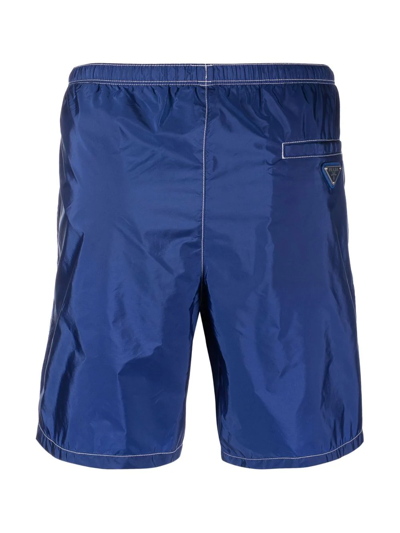 Shop Prada Elasticated Waistband Swim Shorts In Blue
