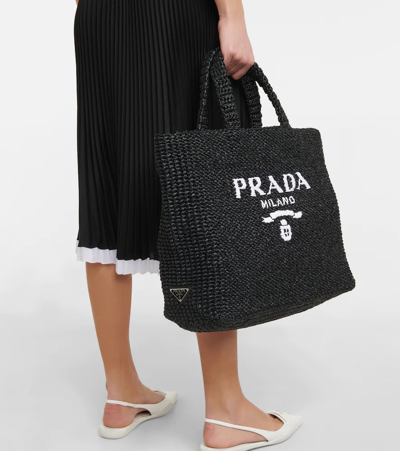 Prada Logo Embroidered Raffia Tote Bag In Black