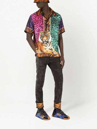 Shop Dolce & Gabbana Tiger-print Cuff Jeans In Schwarz