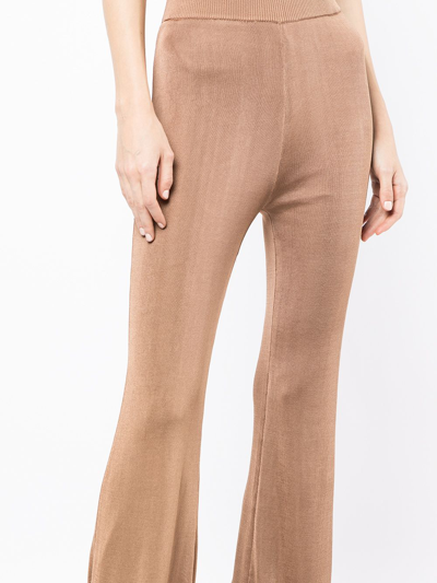 Shop Staud Stretch Flared Trousers In Braun